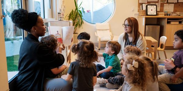 Educator reading to children