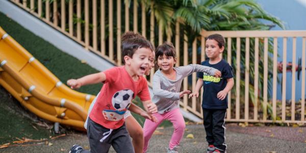 Kids running on a playground. Image courtesy Christina Frigo