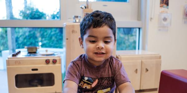 Smiling boy in classroom