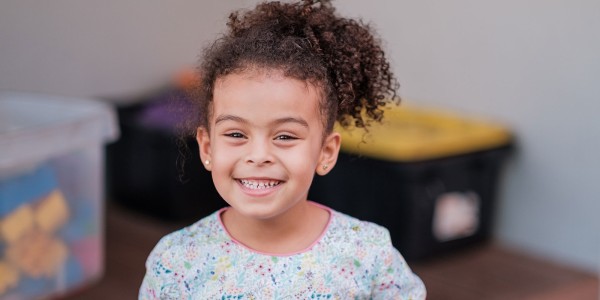 Smiling girl in focus