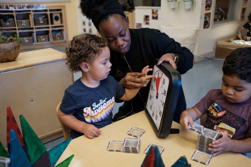 early educator working with young child 