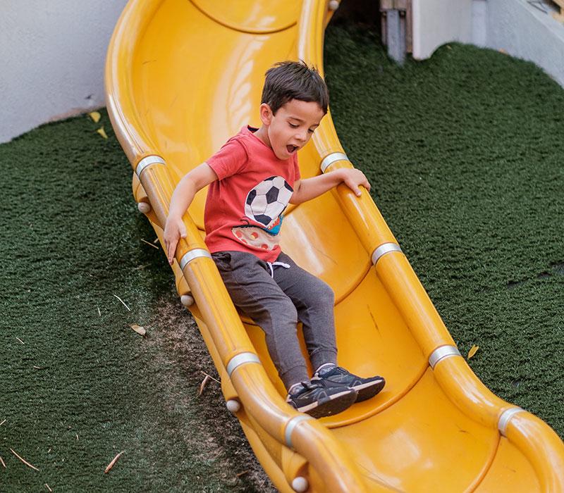 Boy on slide