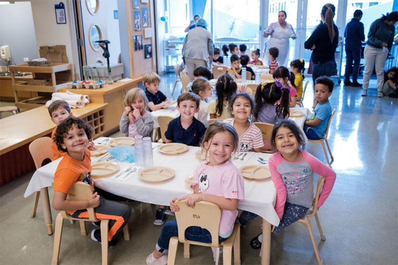 Kids eating food together