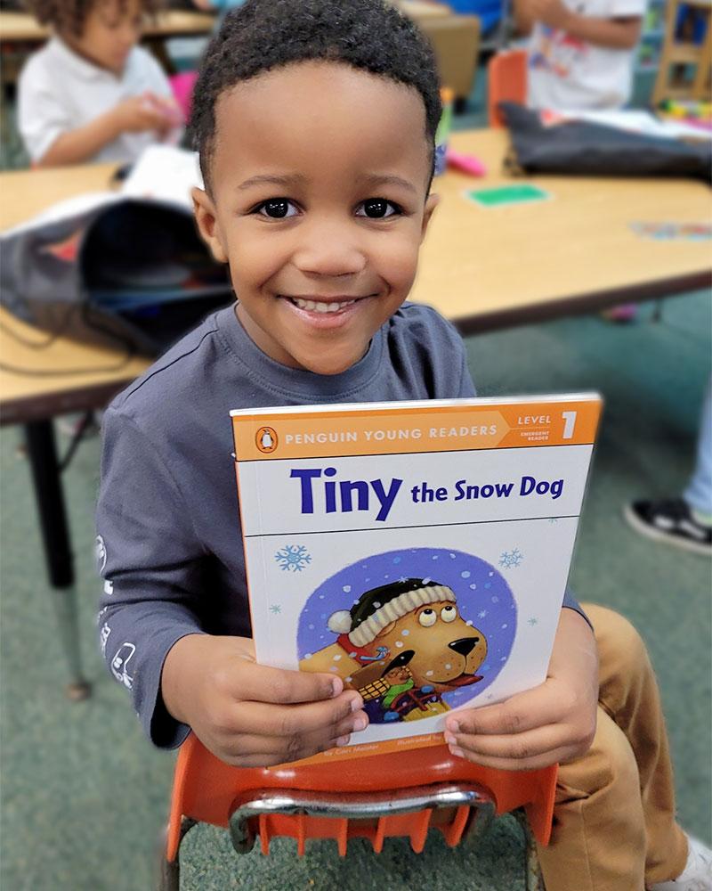 Boy holding book